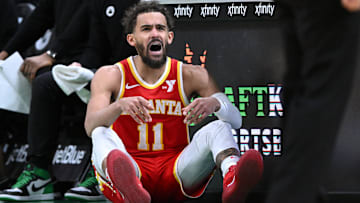 Atlanta Hawks guard Trae Young reacts during a game against the Boston Celtics at the TD Garden.