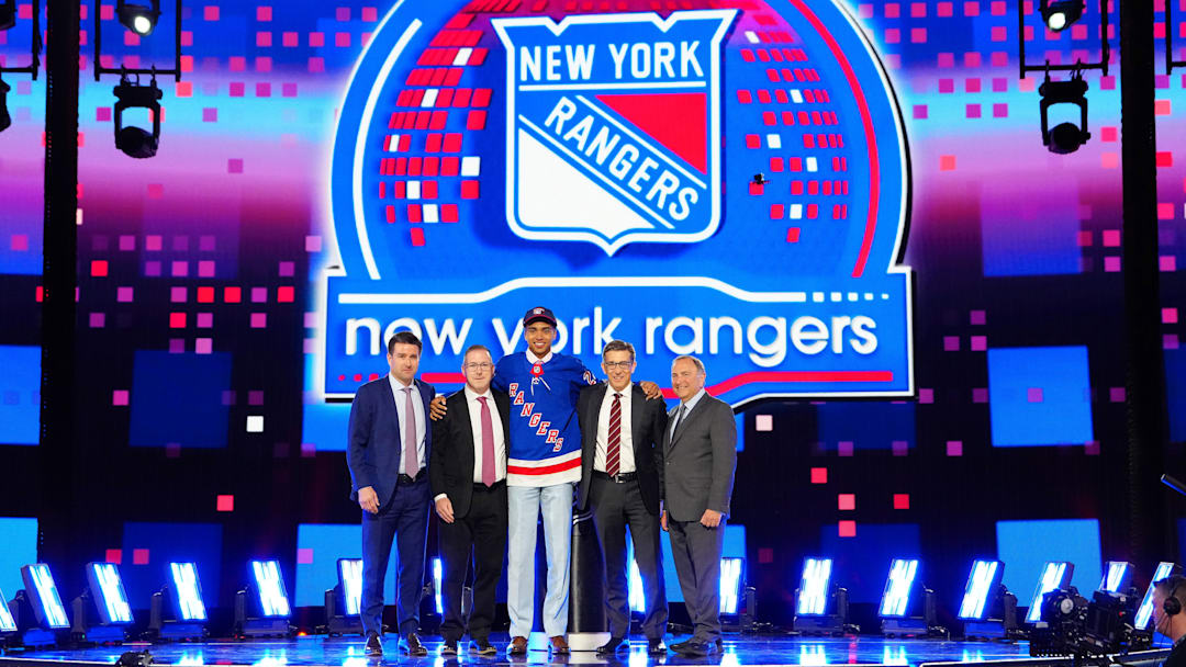 Jun 28, 2024; Las Vegas, Nevada, USA; Eric (EJ) Emery is selected by the New York Rangers with the 30th overall pick in the first round of the 2024 NHL Draft at The Sphere. Mandatory Credit: Stephen R. Sylvanie-Imagn Images