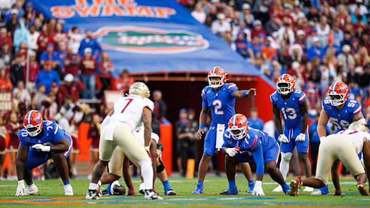 Nov 29, 2025; Gainesville, Florida, USA; Florida Gators quarterback DJ Lagway (2) gestures before the snap against the Florida State Seminoles during the first half at Ben Hill Griffin Stadium. Mandatory Credit: Matt Pendleton-Imagn Images