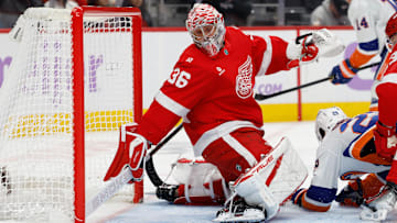 Nov 20, 2025; Detroit, Michigan, USA;  Detroit Red Wings goaltender John Gibson (36) makes the save in the first period against the New York Islanders at Little Caesars Arena. Mandatory Credit: Rick Osentoski-Imagn Images