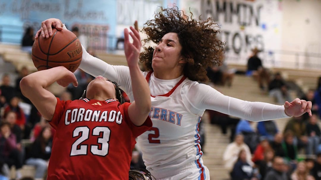 Monterey's Aaliyah Chavez blocks a shot by Coronado's Kamryn Hill in a District 3-5A girls basketball game Tuesday, Jan. 7, 2025, at Monterey High School.