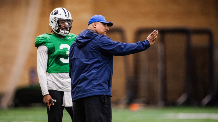 Kalani Sitake coaches Gerry Bohanon during 2024 Spring camp