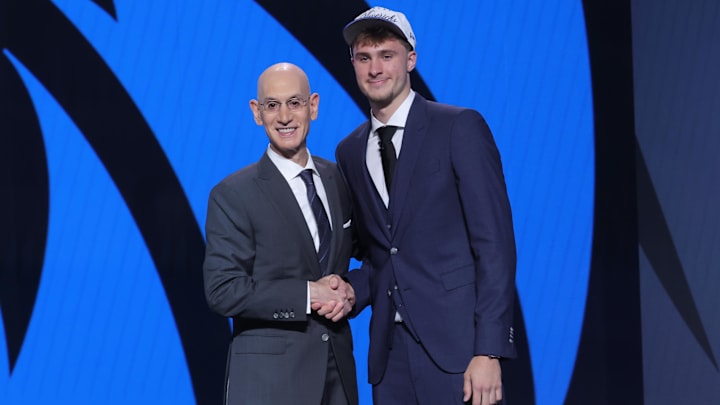 Cooper Flagg poses with NBA commissioner Adam Silver after being selected as first overall by the Dallas Mavericks in the first round of the 2025 NBA Draft at Barclays Center. 