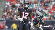 Dec 15, 2024; Houston, Texas, USA; Houston Texans wide receiver Nico Collins (12) gets ready for a play during the game against the Miami Dolphins at NRG Stadium. Mandatory Credit: Troy Taormina-Imagn Images