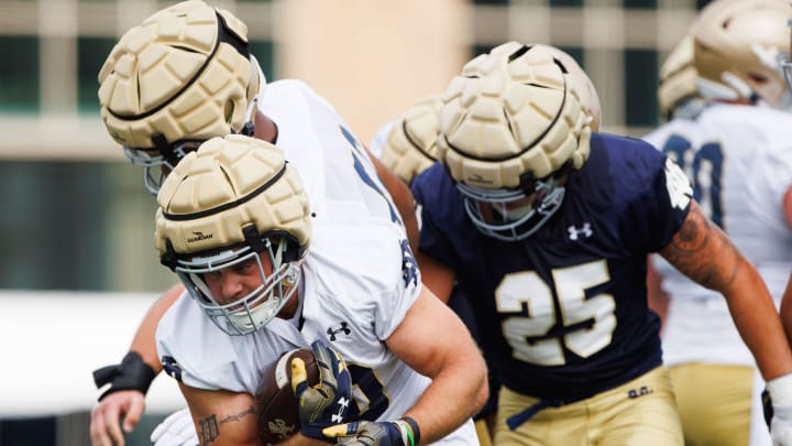 Notre Dame running back Aneyas Williams runs through a gap during a Notre Dame football practice at Irish Athletic Center on Thursday, Aug. 1, 2024, in South Bend.