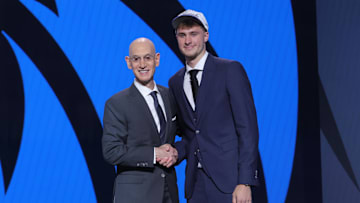 Cooper Flagg poses with NBA commissioner Adam Silver after being selected as first overall by the Dallas Mavericks in the first round of the 2025 NBA Draft at Barclays Center. 