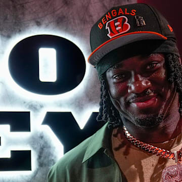 Cincinnati Bengals first round draft pick Shemar Stewart and his dad Moe Marquez show off custom jewelry they had made for each other in the Bengals locker room at Paycor Stadium in downtown Cincinnati on Friday, April 25, 2025.