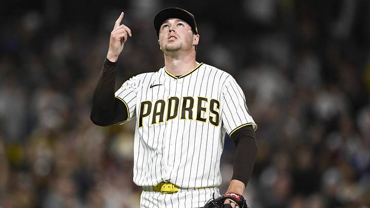 Jun 8, 2026; San Diego, California, USA; San Diego Padres pitcher Mason Miller (22) points skyward after the San Diego Padres beat the Cincinnati Reds at Petco Park. Mandatory Credit: Denis Poroy-Imagn Images