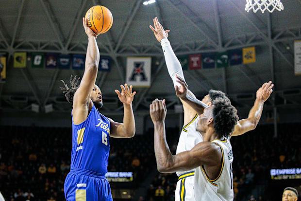 Tulsa forward Jared Garcia shoots the ball against the Wichita State Shockers.