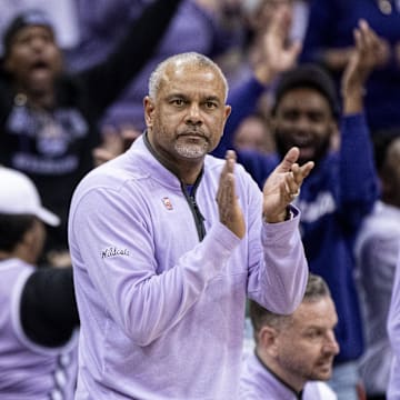 Mar 14, 2024; Kansas City, MO, USA; Kansas State Wildcats head coach Jerome Tang claps during the first half again the Iowa State Cyclones at T-Mobile Center. Mandatory Credit: Amy Kontras-Imagn Images