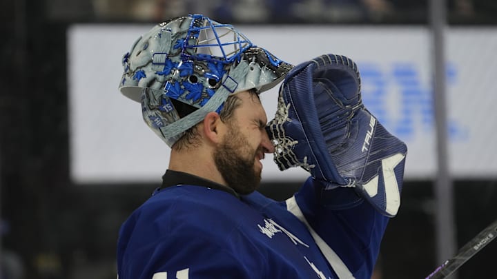 Oct 28, 2025; Toronto, Ontario, CAN; Toronto Maple Leafs goaltender Anthony Stolarz (41) winces during a break in the action against the Calgary Flames during the second period at Scotiabank Arena. Mandatory Credit: John E. Sokolowski-Imagn Images