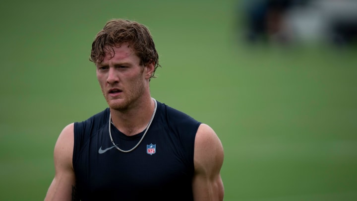 Tennessee Titans quarterback Will Levis (8) heads off the field after practice on the second day of training camp Thursday, July 25, 2024.