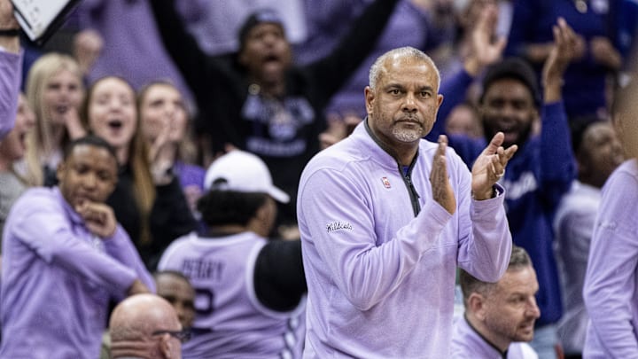 Mar 14, 2024; Kansas City, MO, USA; Kansas State Wildcats head coach Jerome Tang claps during the first half again the Iowa State Cyclones at T-Mobile Center. Mandatory Credit: Amy Kontras-Imagn Images