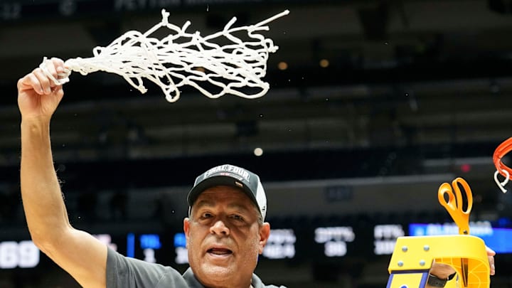 Houston Cougars head coach Kelvin Sampson celebrates after his team defeats the Tennessee Volunteers. Houston Cougars head coach Kelvin Sampson celebrates after his team defeats the Tennessee Volunteers.