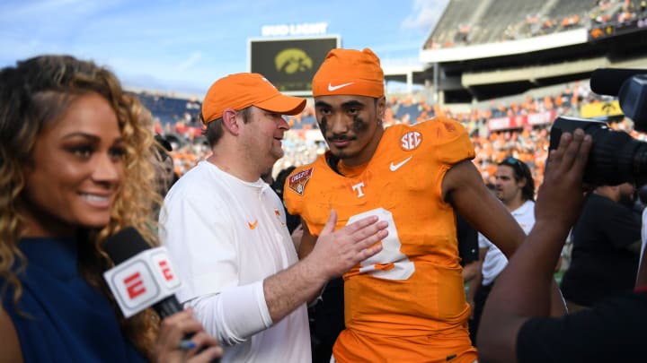 Tennessee head coach Josh Heupel turns to quarterback Nico Iamaleava (8) after their post game interview after winning the Citrus Bowl NCAA College football game on Monday, January 1, 2024 in Orlando, Fla. against Iowa.