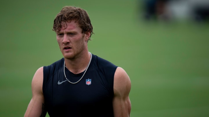 Tennessee Titans quarterback Will Levis (8) heads off the field after practice on the second day of training camp Thursday, July 25, 2024.