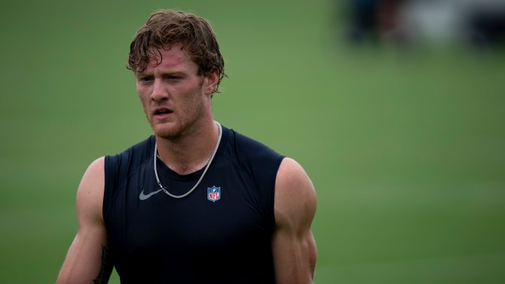 Tennessee Titans quarterback Will Levis (8) heads off the field after practice on the second day of training camp Thursday, July 25, 2024.