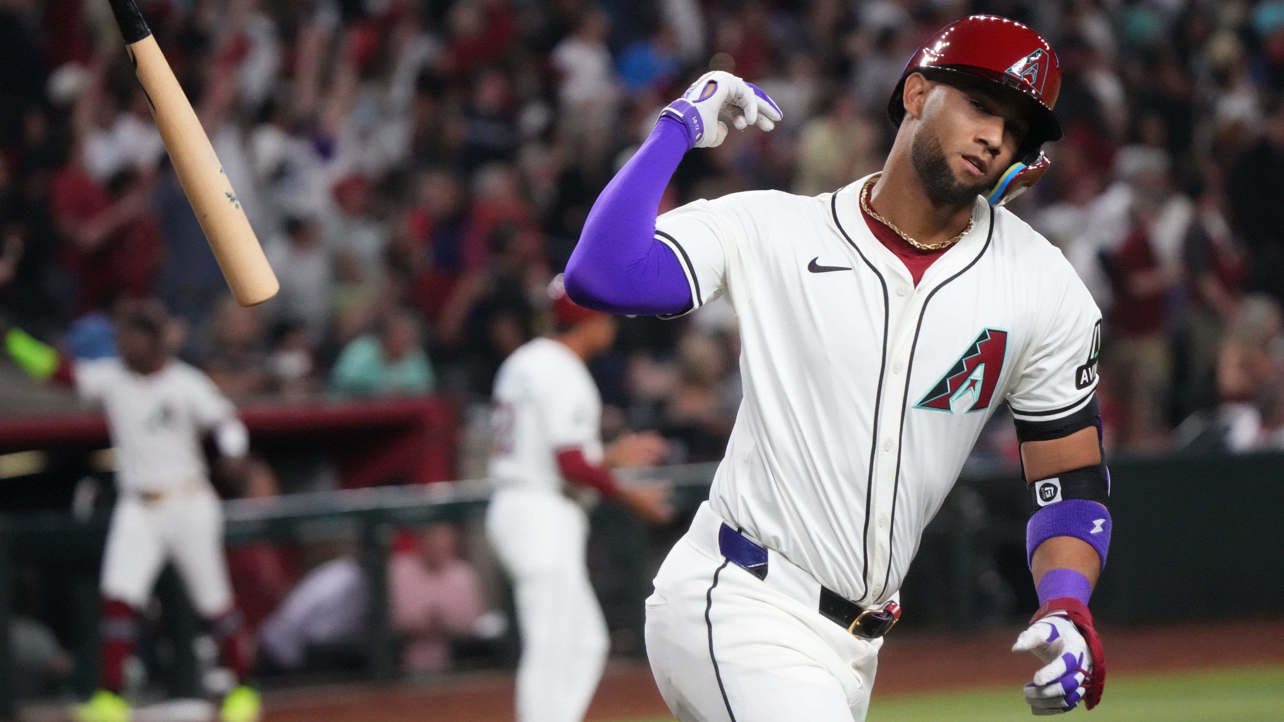 Arizona Diamondbacks left fielder Lourdes Gurriel celebrates hitting a two-run home run in the first inning.