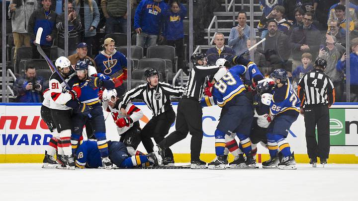 Dec 17, 2024; St. Louis, Missouri, USA;  St. Louis Blues and the New Jersey Devils get in a scuffle during the third period at Enterprise Center. Mandatory Credit: Jeff Curry-Imagn Images