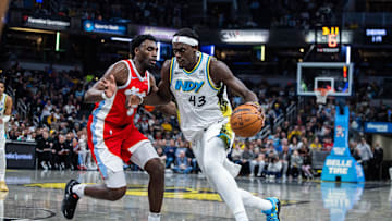 Feb 20, 2025; Indianapolis, Indiana, USA; Indiana Pacers forward Pascal Siakam (43) dribbles the ball while Memphis Grizzlies guard Vince Williams Jr. (5)defends in the second half at Gainbridge Fieldhouse. Mandatory Credit: Trevor Ruszkowski-Imagn Images