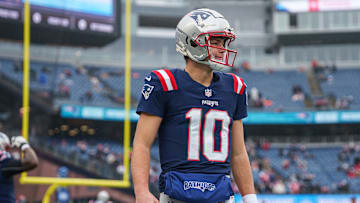 Dec 28, 2024; Foxborough, Massachusetts, USA; New England Patriots quarterback Drake Maye (10) warms up before the start of the game against the Los Angeles Chargers at Gillette Stadium. Mandatory Credit: David Butler II-Imagn Images