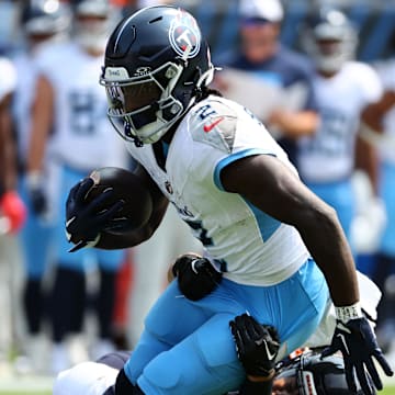 Sep 8, 2024; Chicago, Illinois, USA; Tennessee Titans running back Tyjae Spears (2) makes a catch against the Chicago Bears during the first quarter at Soldier Field. Mandatory Credit: Mike Dinovo-Imagn Images