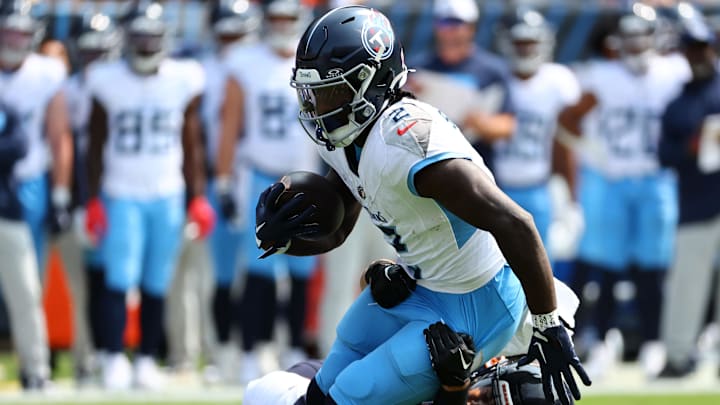 Sep 8, 2024; Chicago, Illinois, USA; Tennessee Titans running back Tyjae Spears (2) makes a catch against the Chicago Bears during the first quarter at Soldier Field. Mandatory Credit: Mike Dinovo-Imagn Images