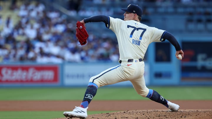 Aug 10, 2024; Los Angeles, California, USA;  Los Angeles Dodgers starting pitcher River Ryan (77) pitches during the third inning against the Pittsburgh Pirates at Dodger Stadium. Mandatory Credit: Kiyoshi Mio-USA TODAY Sports