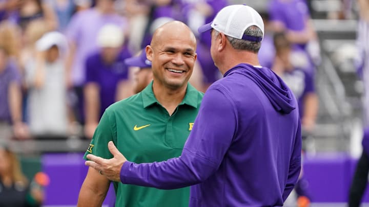 Baylor coach Dave Aranda (left) and TCU coach Sonny Dykes have the best two college football coaching jobs in the Big 12. Baylor coach Dave Aranda (left) and TCU coach Sonny Dykes have the best two college football coaching jobs in the Big 12.