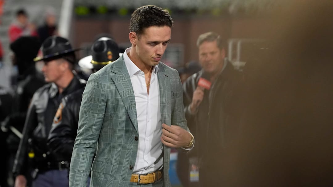 Georgia quarterback Carson Beck (15) arrives before the start of a NCAA college football game against Georgia Tech in Athens, Ga., on Friday, Nov. 29, 2024.