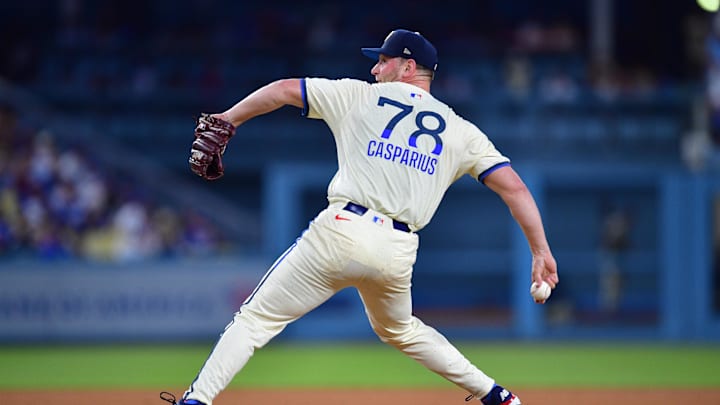 Jul 19, 2025; Los Angeles, California, USA; Los Angeles Dodgers pitcher Ben Casparius (78) throws against the Milwaukee Brewers during the seventh inning at Dodger Stadium. Mandatory Credit: Gary A. Vasquez-Imagn Images