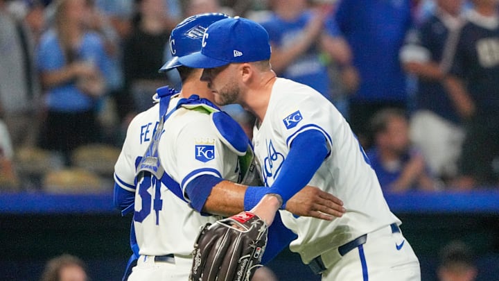 Sep 4, 2024; Kansas City, Missouri, USA; Kansas City Royals pitcher Lucas Erceg (60) celebrates with catcher Freddy Fermin (34) after the win over the Cleveland Guardians at Kauffman Stadium. Mandatory Credit: Denny Medley-Imagn Images