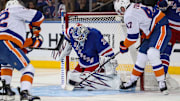 Sep 24, 2024; New York, New York, USA; New York Rangers goalie Igor Shesterkin (31) makes a save on New York Islanders forward Liam Foudy (47) during the second period at Madison Square Garden. Mandatory Credit: Danny Wild-Imagn Images