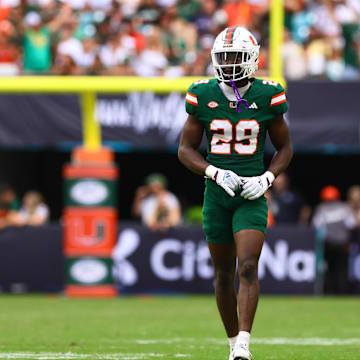 Nov 2, 2024; Miami Gardens, Florida, USA; Miami Hurricanes defensive back OJ Frederique Jr. (29) plays his position against the Duke Blue Devils during the fourth quarter at Hard Rock Stadium. Mandatory Credit: Sam Navarro-Imagn Images