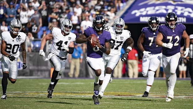 Baltimore Ravens quarterback Lamar Jackson (8) runs during the second half against the Las Vegas Raiders at M&T Bank Stad