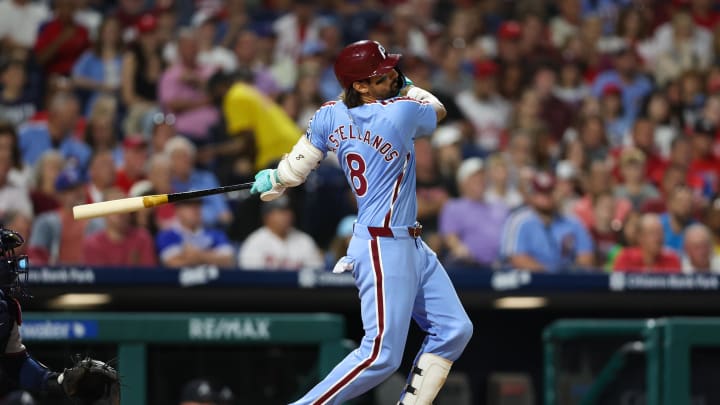 Aug 29, 2024; Philadelphia, Pennsylvania, USA; Philadelphia Phillies outfielder Nick Castellanos (8) hits a two RBI home run during the seventh inning against the Atlanta Braves at Citizens Bank Park. 