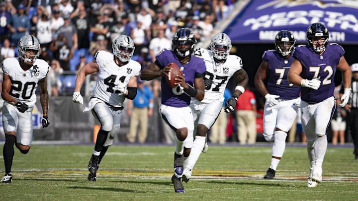 Baltimore Ravens quarterback Lamar Jackson (8) runs during the second half against the Las Vegas Raiders at M&T Bank Stadium.