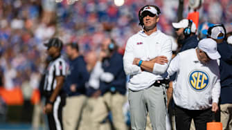 Nov 23, 2024; Gainesville, Florida, USA; Mississippi Rebels head coach Lane Kiffin looks on against the Florida Gators during the first half at Ben Hill Griffin Stadium. Mandatory Credit: Matt Pendleton-Imagn Images