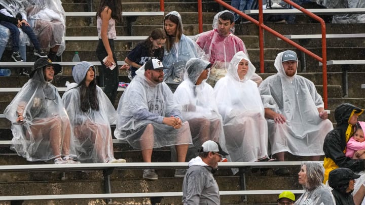 Fans brave rain and lightning to watch the Class 1A and 6A UIL State track and field meet on