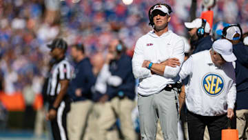 Nov 23, 2024; Gainesville, Florida, USA; Mississippi Rebels head coach Lane Kiffin looks on against the Florida Gators during the first half at Ben Hill Griffin Stadium. Mandatory Credit: Matt Pendleton-Imagn Images