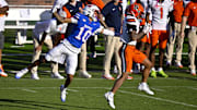 Oct 4, 2025; Dallas, Texas, USA; Syracuse Orange defensive back Davien Kerr (10) intercepts a pass in front of SMU Mustangs wide receiver Jalen Cooper (10) during the second half at Gerald J. Ford Stadium. Mandatory Credit: Jerome Miron-Imagn Images