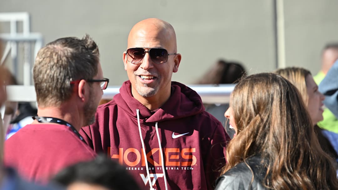 Virginia Tech head coach James Franklin speaks to fans on the sideline before a Hokies game at Lane Stadium. 