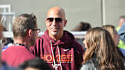 Virginia Tech head coach James Franklin speaks to fans on the sideline before a Hokies game at Lane Stadium. 