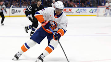 Mar 29, 2025; Tampa, Florida, USA; New York Islanders left wing Anthony Duclair (11) skates with the puck against the Tampa Bay Lightning during the first period at Amalie Arena. Mandatory Credit: Kim Klement Neitzel-Imagn Images