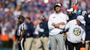 Nov 23, 2024; Gainesville, Florida, USA; Mississippi Rebels head coach Lane Kiffin looks on against the Florida Gators during the first half at Ben Hill Griffin Stadium. Mandatory Credit: Matt Pendleton-Imagn Images