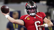 Dec 22, 2024; Arlington, Texas, USA; Tampa Bay Buccaneers quarterback Baker Mayfield (6) throws a pass before the game against the Dallas Cowboys at AT&T Stadium. Mandatory Credit: Tim Heitman-Imagn Images