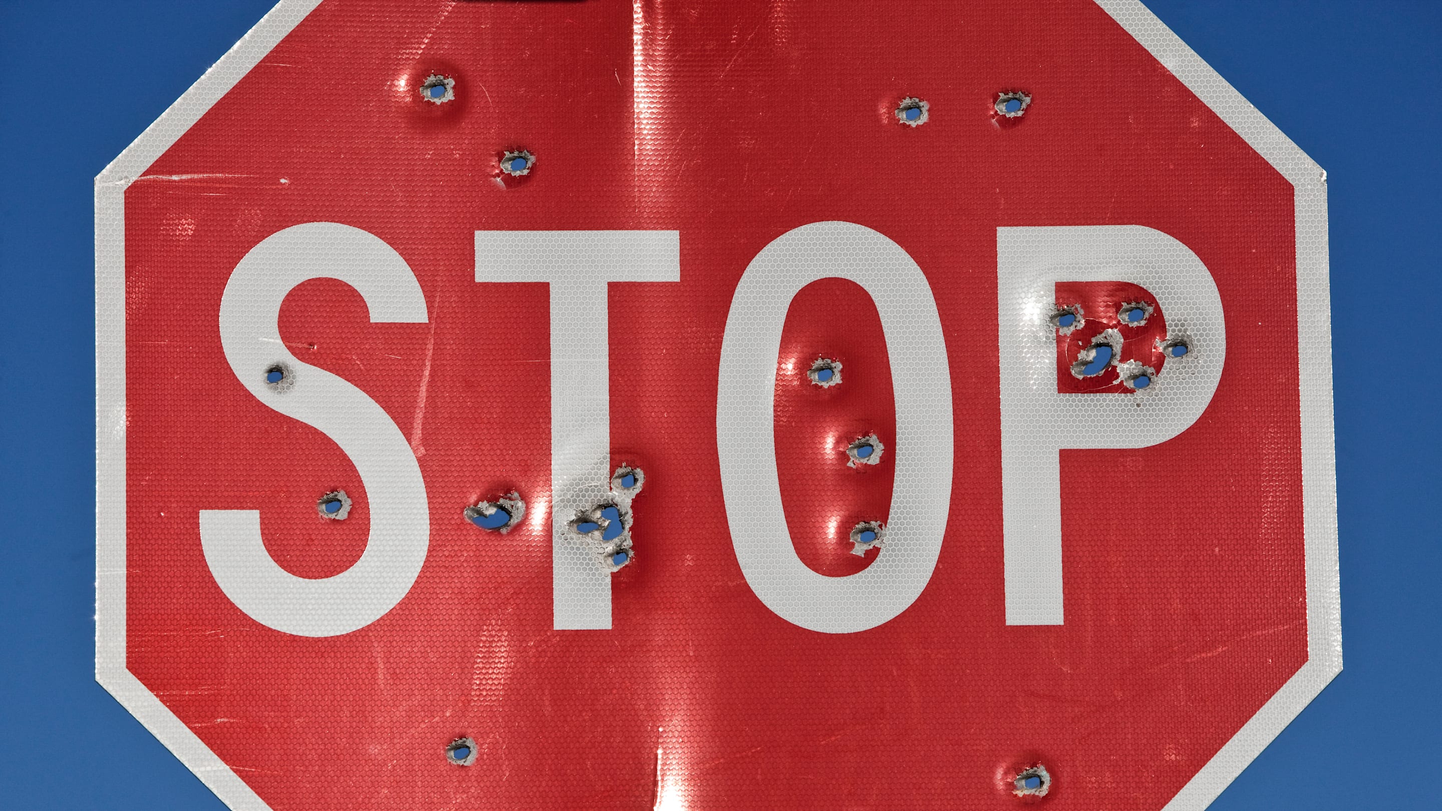 Why Do Some Road Signs Have Holes in Them?