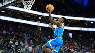 Mar 14, 2024; Las Vegas, NV, USA; UCLA Bruins guard Dylan Andrews (2) shoots against the Oregon Ducks during the second half at T-Mobile Arena. Mandatory Credit: Stephen R. Sylvanie-Imagn Images