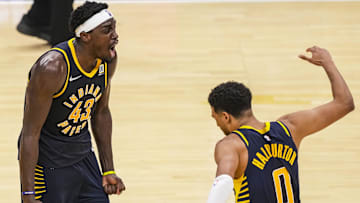 Oct 30, 2024; Indianapolis, Indiana, USA; Indiana Pacers forward Pascal Siakam (43) and guard Tyrese Haliburton (0) celebrate Siakam’s game-winning three point basket against the Boston Celtics at Gainbridge Fieldhouse. Mandatory Credit: Grace Smith-Imagn Images