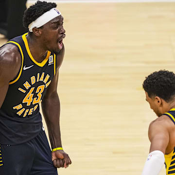 Oct 30, 2024; Indianapolis, Indiana, USA; Indiana Pacers forward Pascal Siakam (43) and guard Tyrese Haliburton (0) celebrate Siakam’s game-winning three point basket against the Boston Celtics at Gainbridge Fieldhouse. Mandatory Credit: Grace Smith-Imagn Images